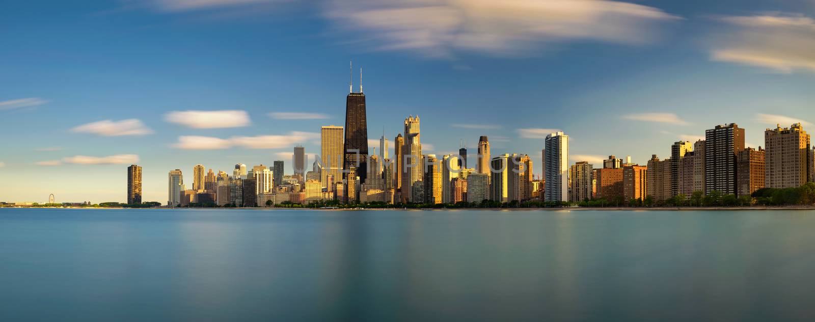 Chicago skyline at sunset viewed from North Avenue Beach by nickfox