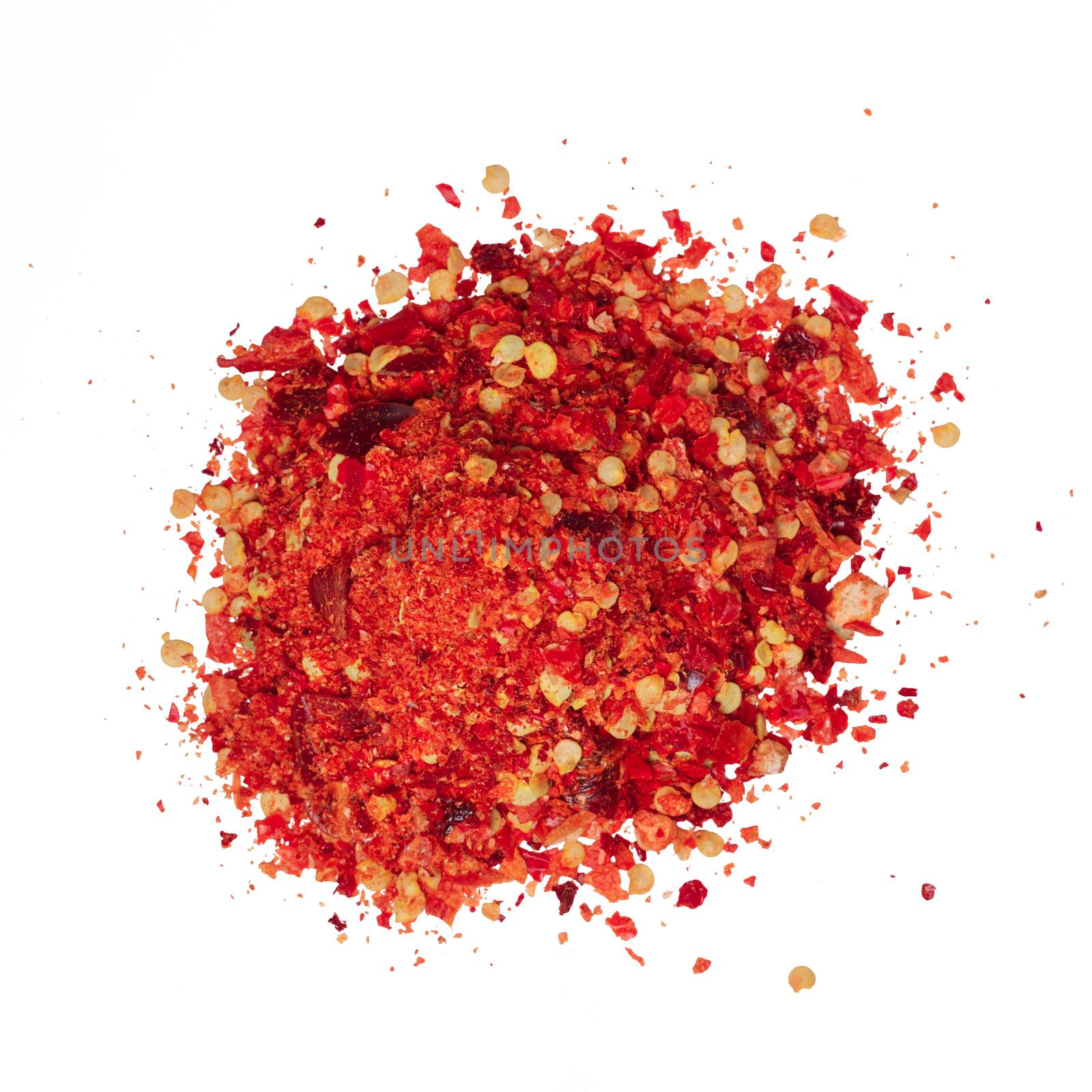 Pile of crushed red pepper (flakes, RPF), the dried and crushed cayennes with seeds. Clipping paths,top view