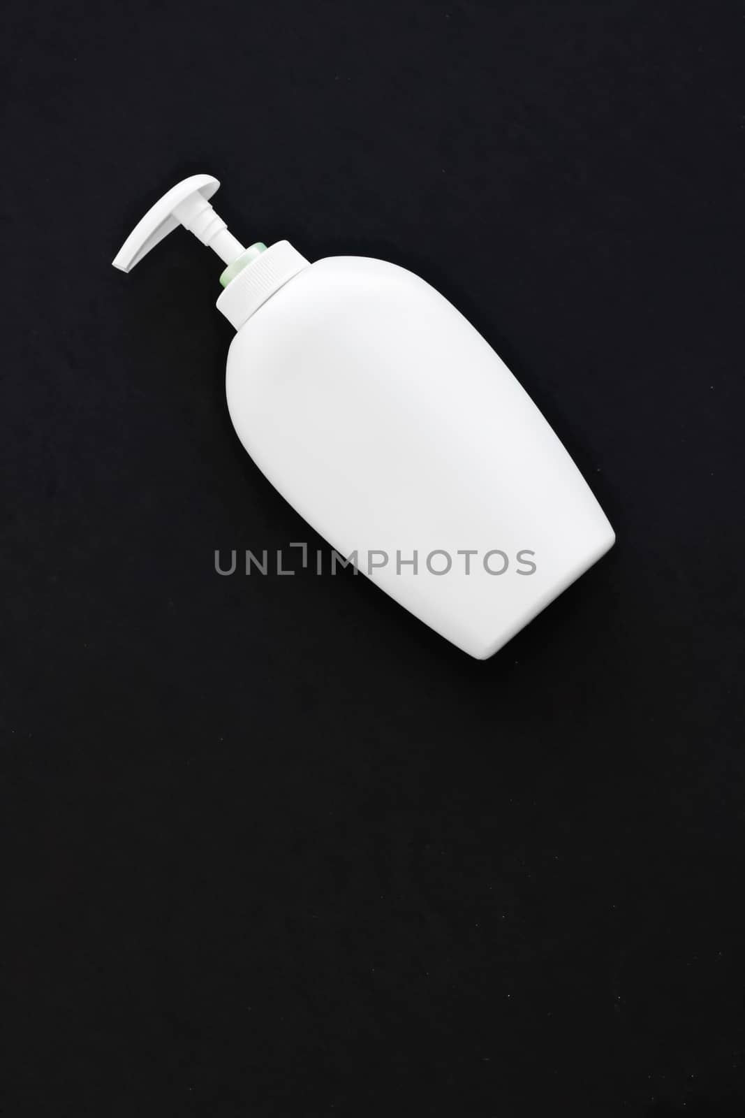 Blank label cosmetic container bottle as product mockup on black background by Anneleven