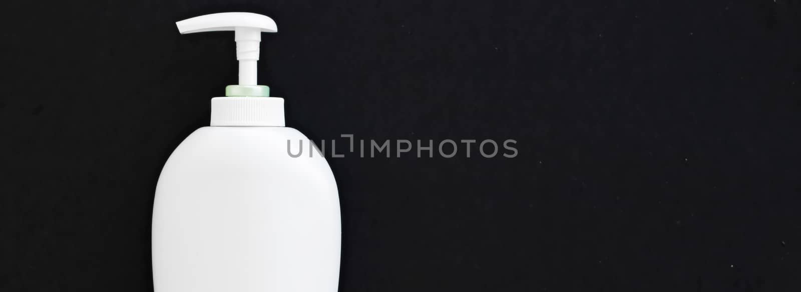 Blank label cosmetic container bottle as product mockup on black background by Anneleven