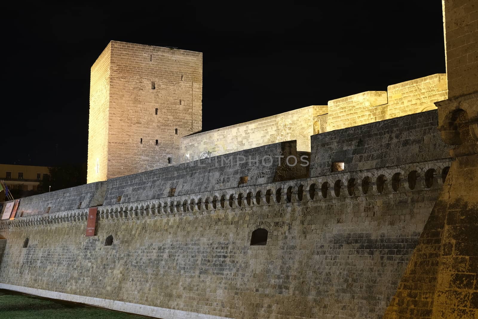 Walls of the Norman Swabian castle of Bari. Filming with night l by Paolo_Grassi