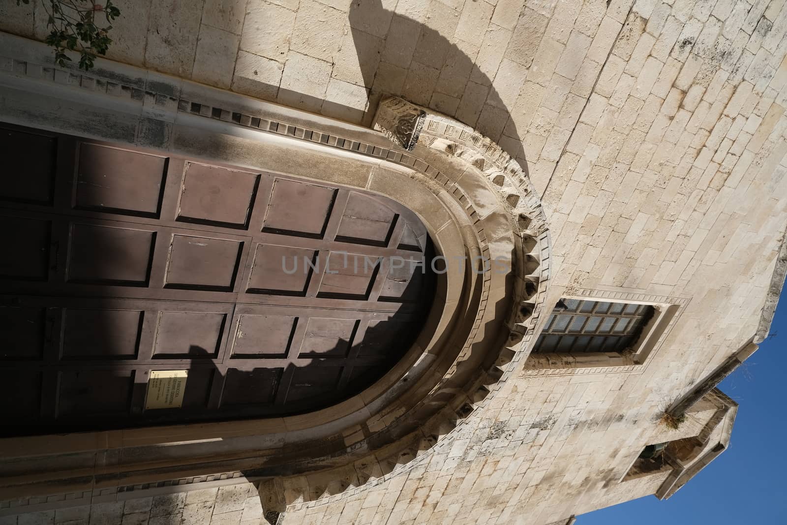 Bari, Puglia, Italy. About 11/2019. Stone portal of the small medieval church of Giovanni Crisostomo, or Giovanni d'Antiochia in Bari.