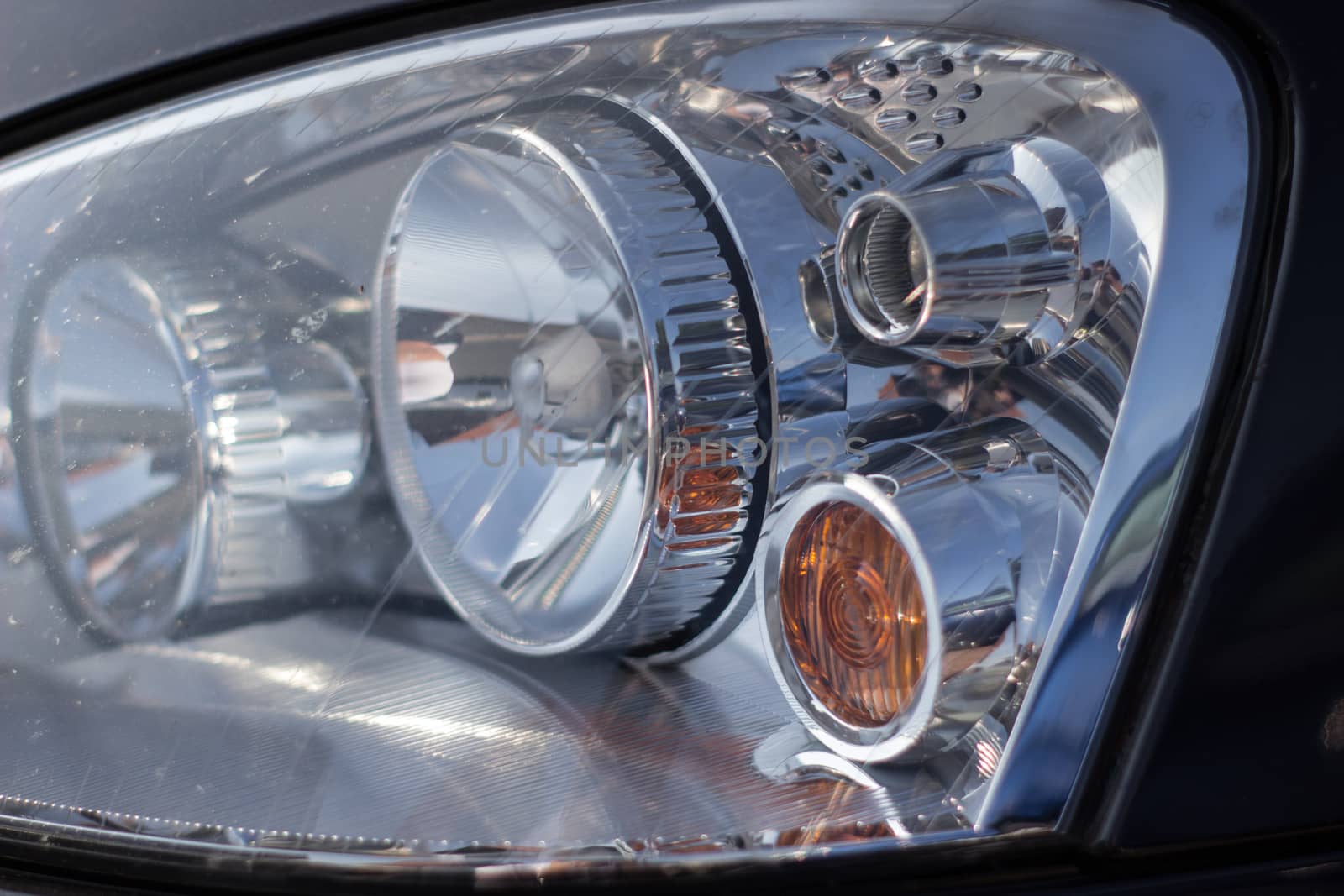 Right front headlight of the car.