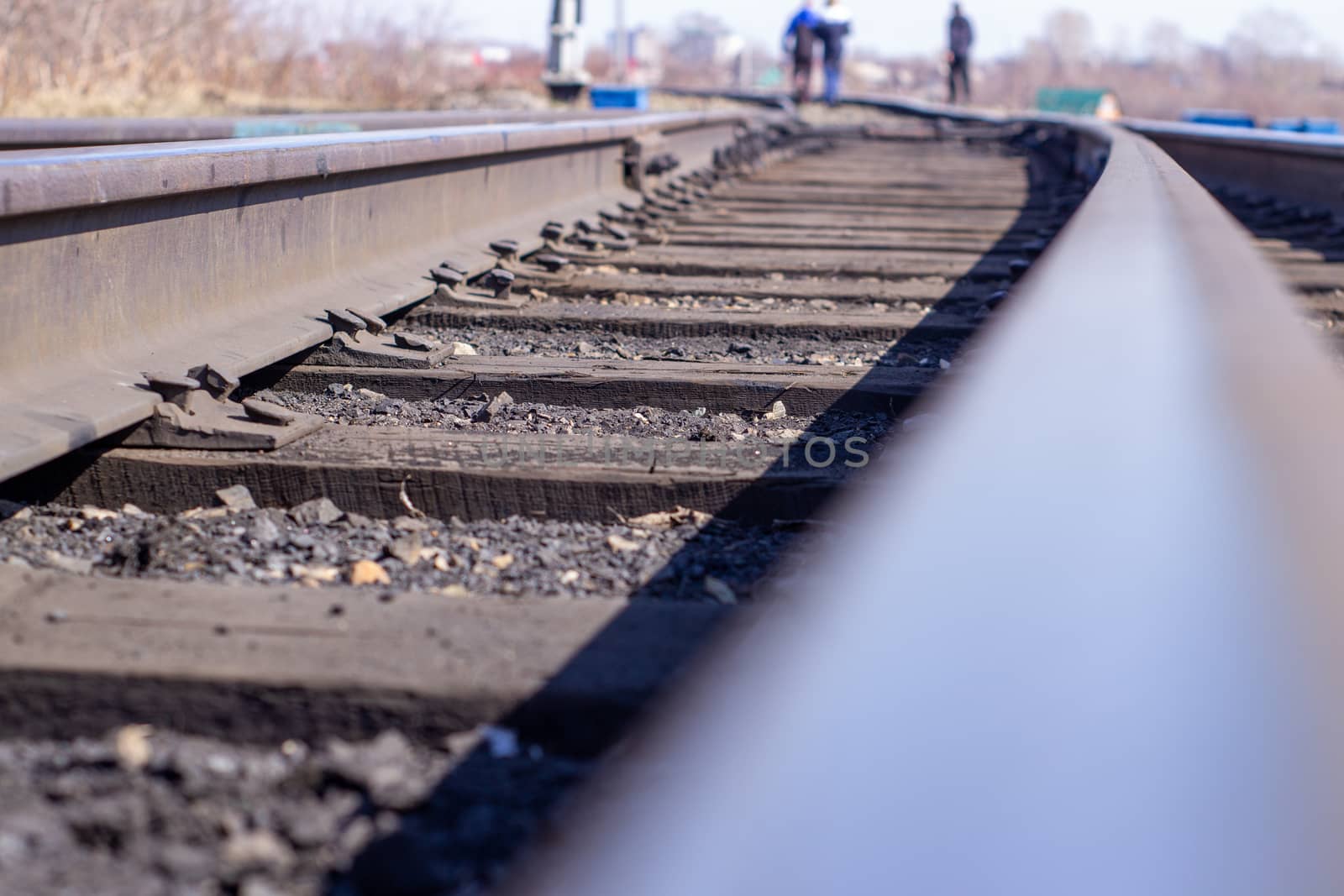 Long rails close-up. Railway. The wooden sleepers.