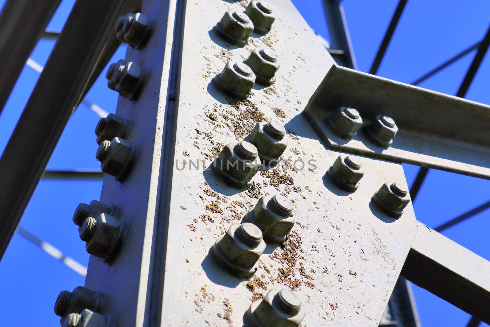 Close up view on a big power pylon transporting electricity in a countryside area in Europe