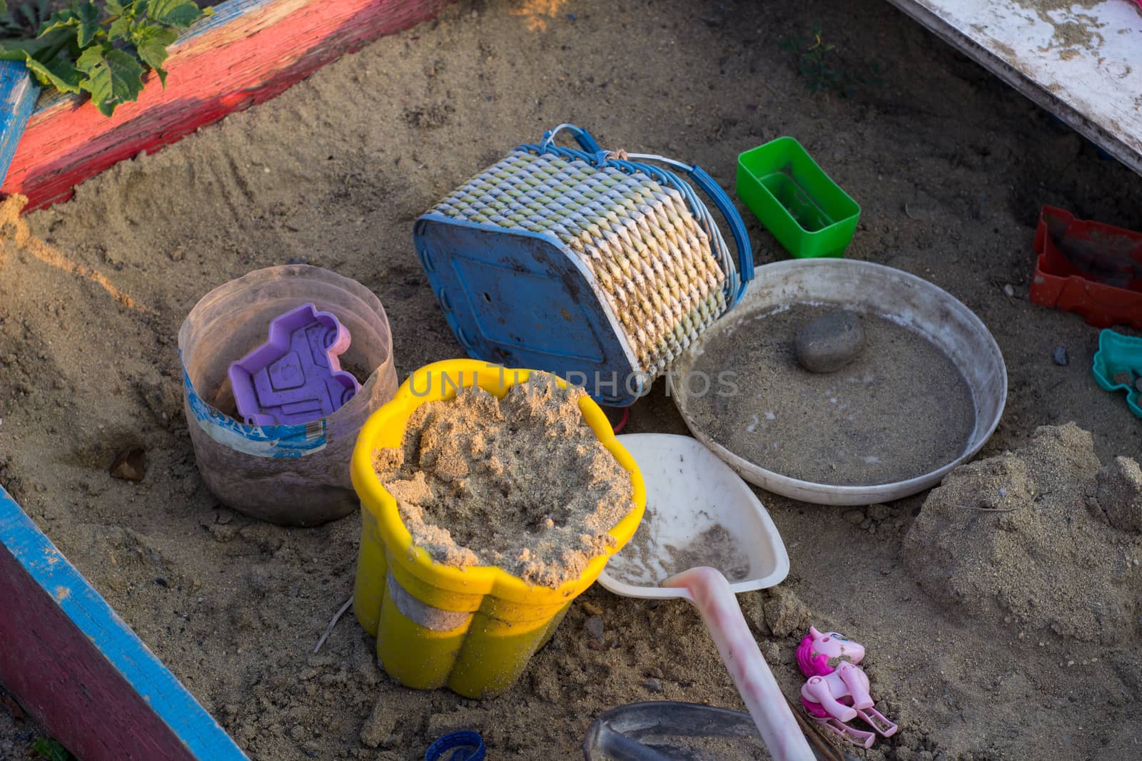 Sandcastle with bucket and shovel