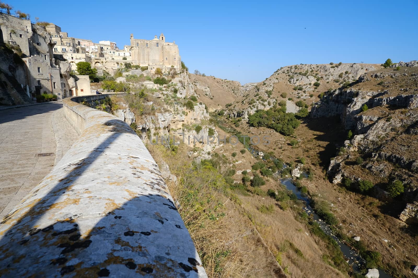 View of the city of Matera in Basilicata and the Gravina stream. During the rains the stream collects the waters that fall copious.