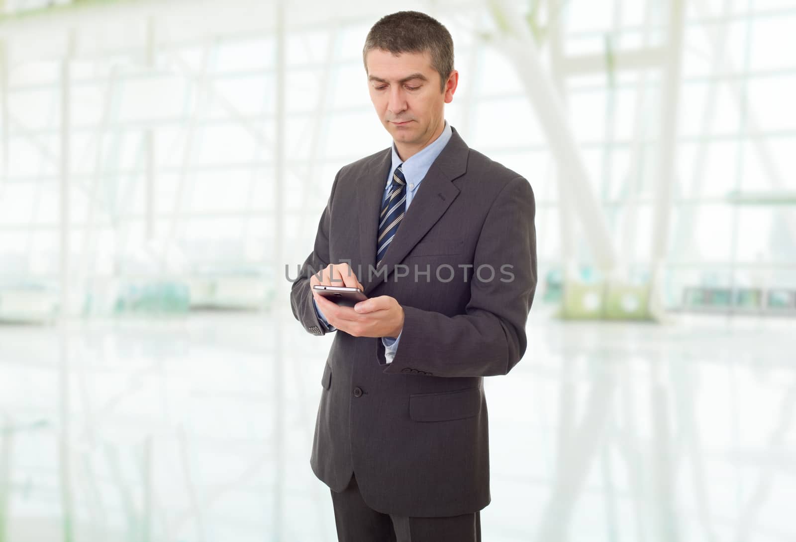 worried business man on the phone, at the office