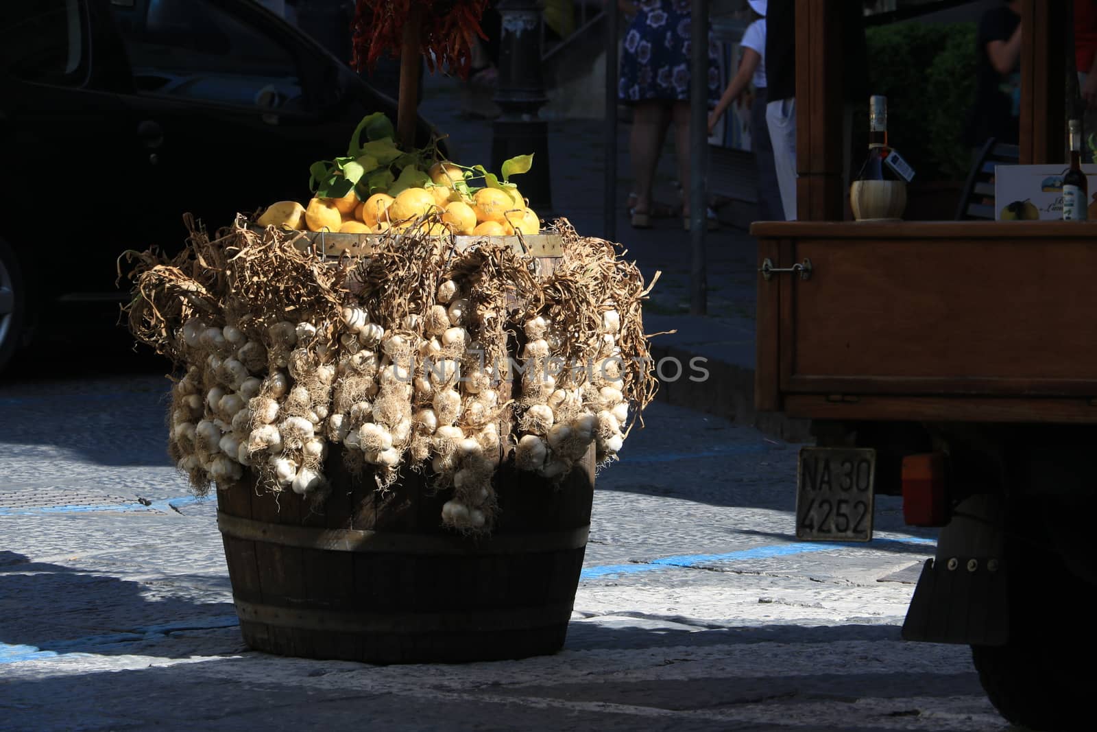 Basket with garlic and lemons for sale in the Island of Ischia, near Naples, Italy.