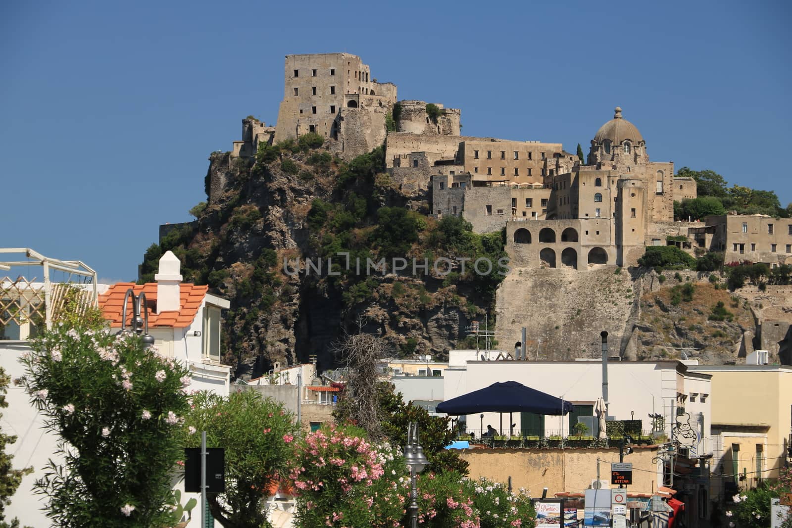 Ancient Aragonese Castle in Ischia Ponte. The fortification stands on a peninsula of volcanic rock connected to the village of Ponte. Ischia, Naples, Italy. 
