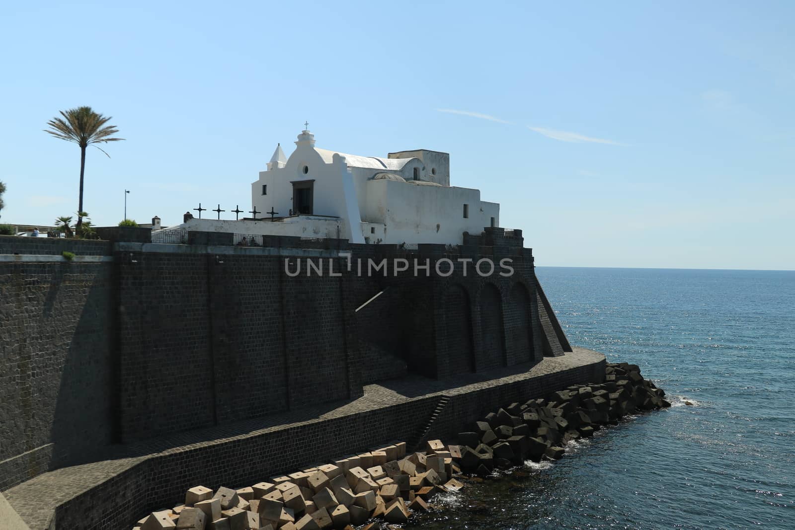 Church of Soccorso in Forio on the island of Ischia near Naples. Example of typical Mediterranean architecture rises above the sea.