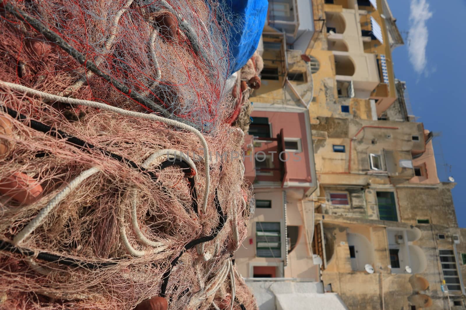 Fishing net on the dock of the port of Corricella, Procida.