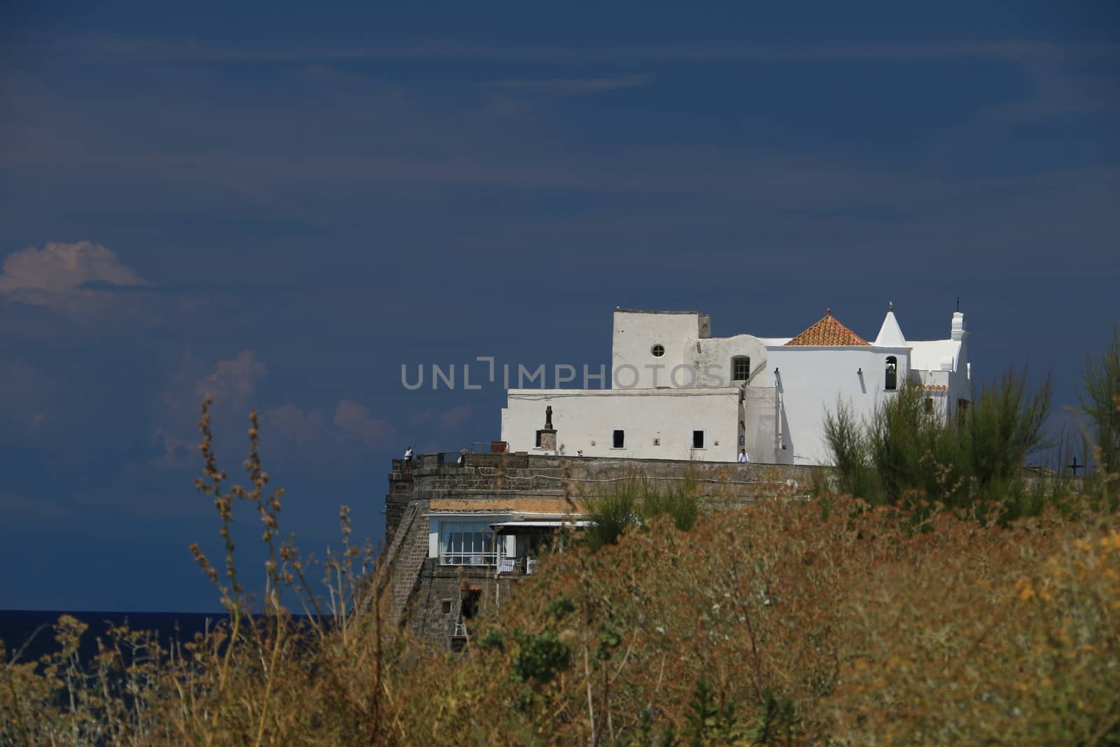 Church of Soccorso in Forio on the island of Ischia near Naples. Example of typical Mediterranean architecture rises above the sea.