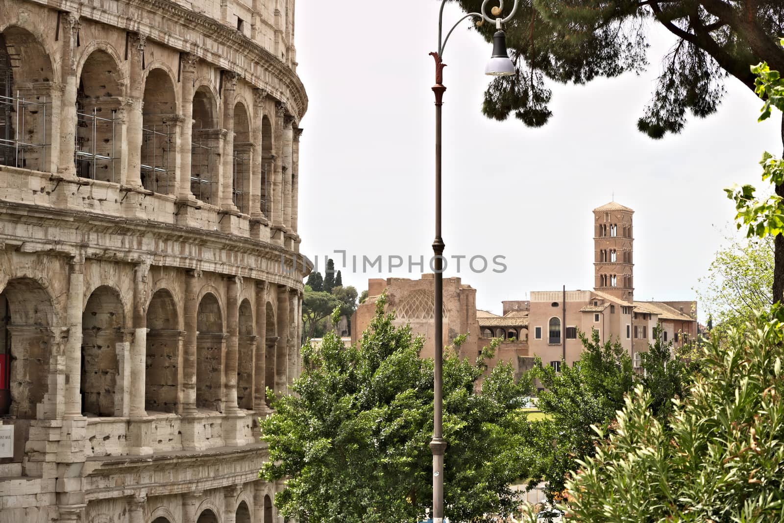 Rome, Italy. 05/03/2019. In the foreground an external wall of the Colosseum and in the background the Imperial Forums. The area is a huge open-air museum.