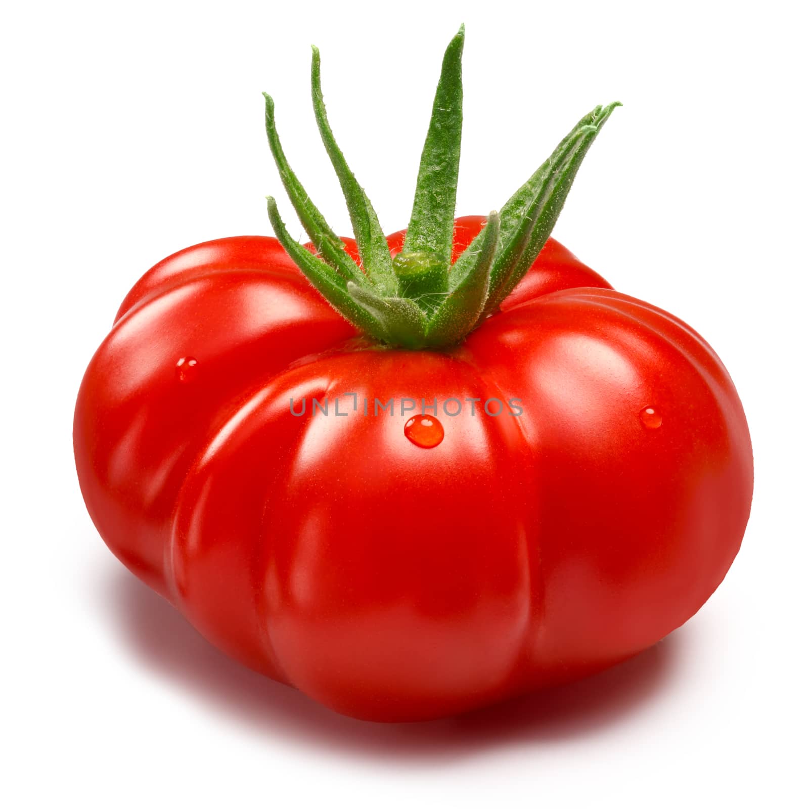 Ripe Heirloom Tomato (Togorific) with sepal. Clipping paths, shadow separated, infinite depth of field