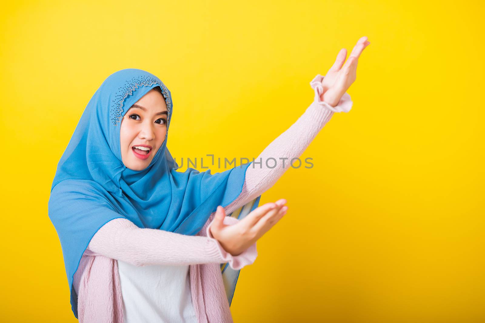 Asian Muslim Arab woman Islam wear hijab she open arms for hug by Sorapop