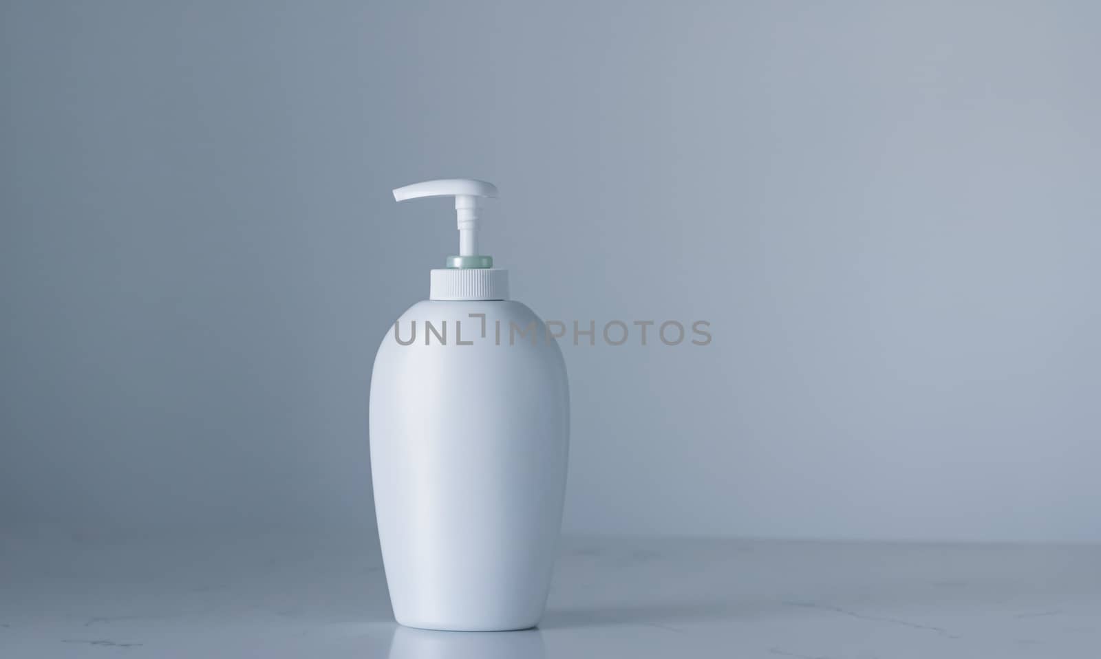 Blank label cosmetic container bottle as product mockup on gray background, hygiene and healthcare