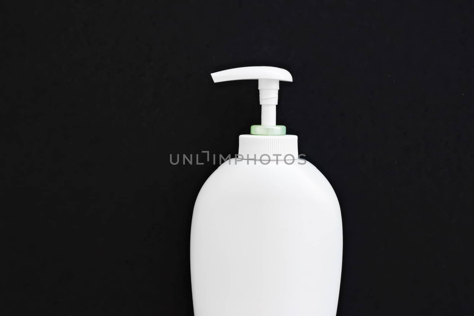 Blank label cosmetic container bottle as product mockup on black background by Anneleven