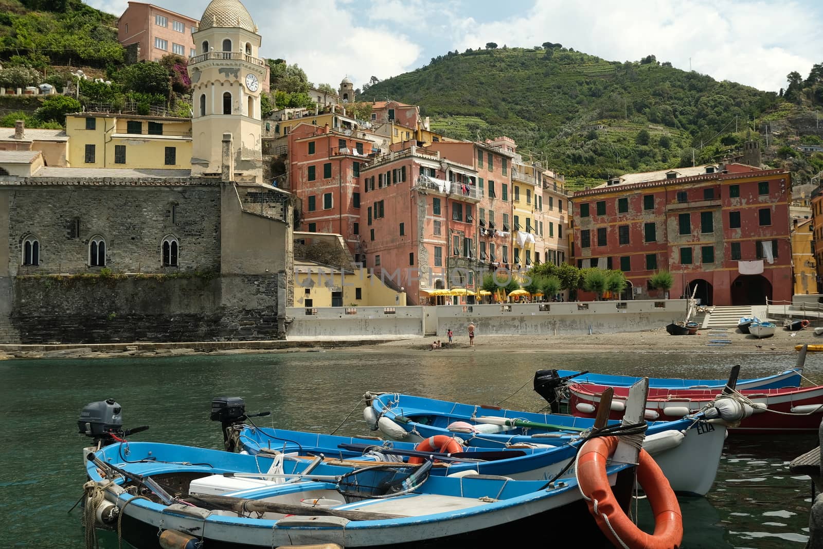 Vernazza, Cinque Terre, Liguria, Italy. About 6/2020. Colorful village houses overlooking the sea. Stock photo royalty free. Colored fishing boats.