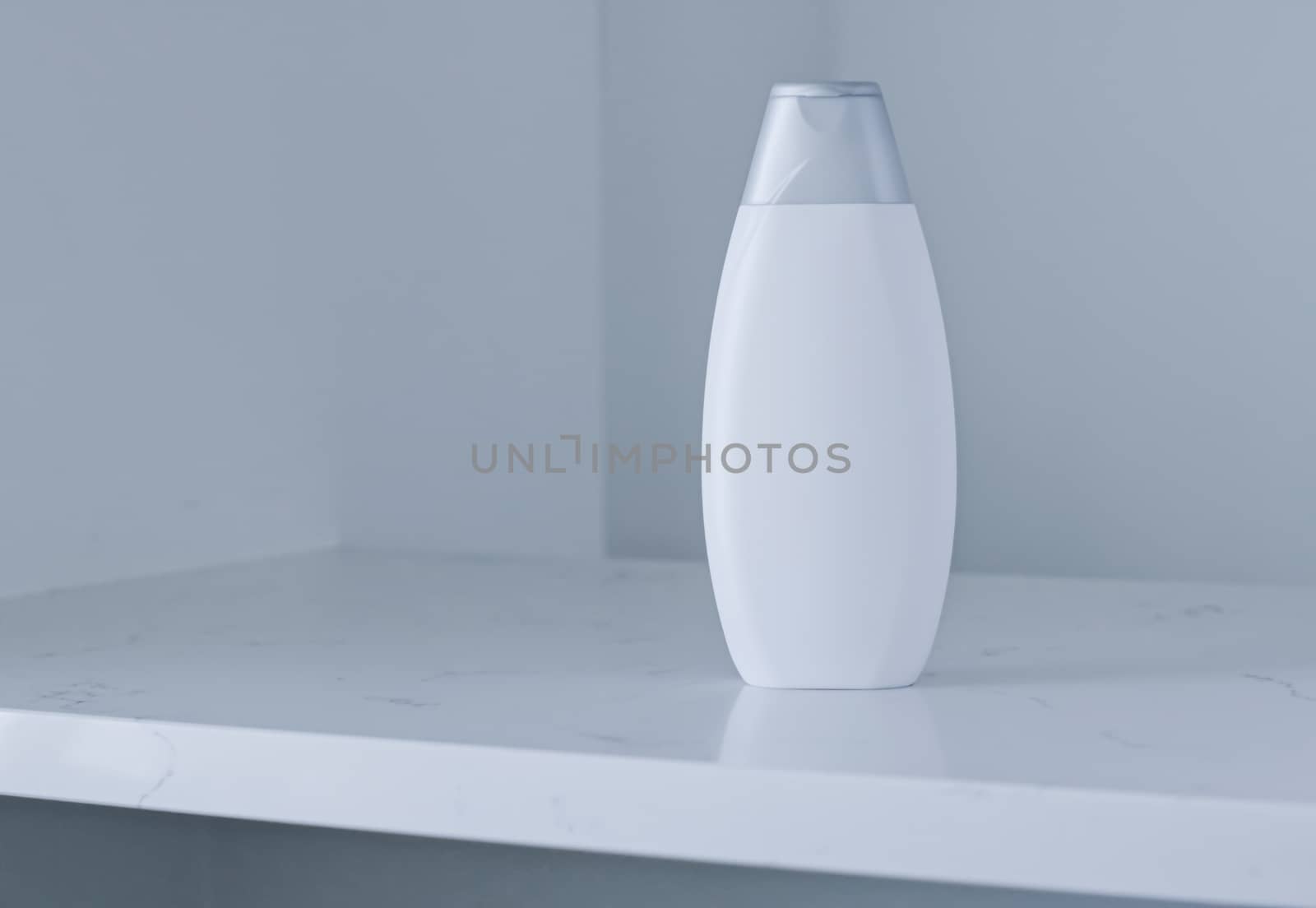 Blank label cosmetic container bottle as product mockup on gray background, hygiene and healthcare