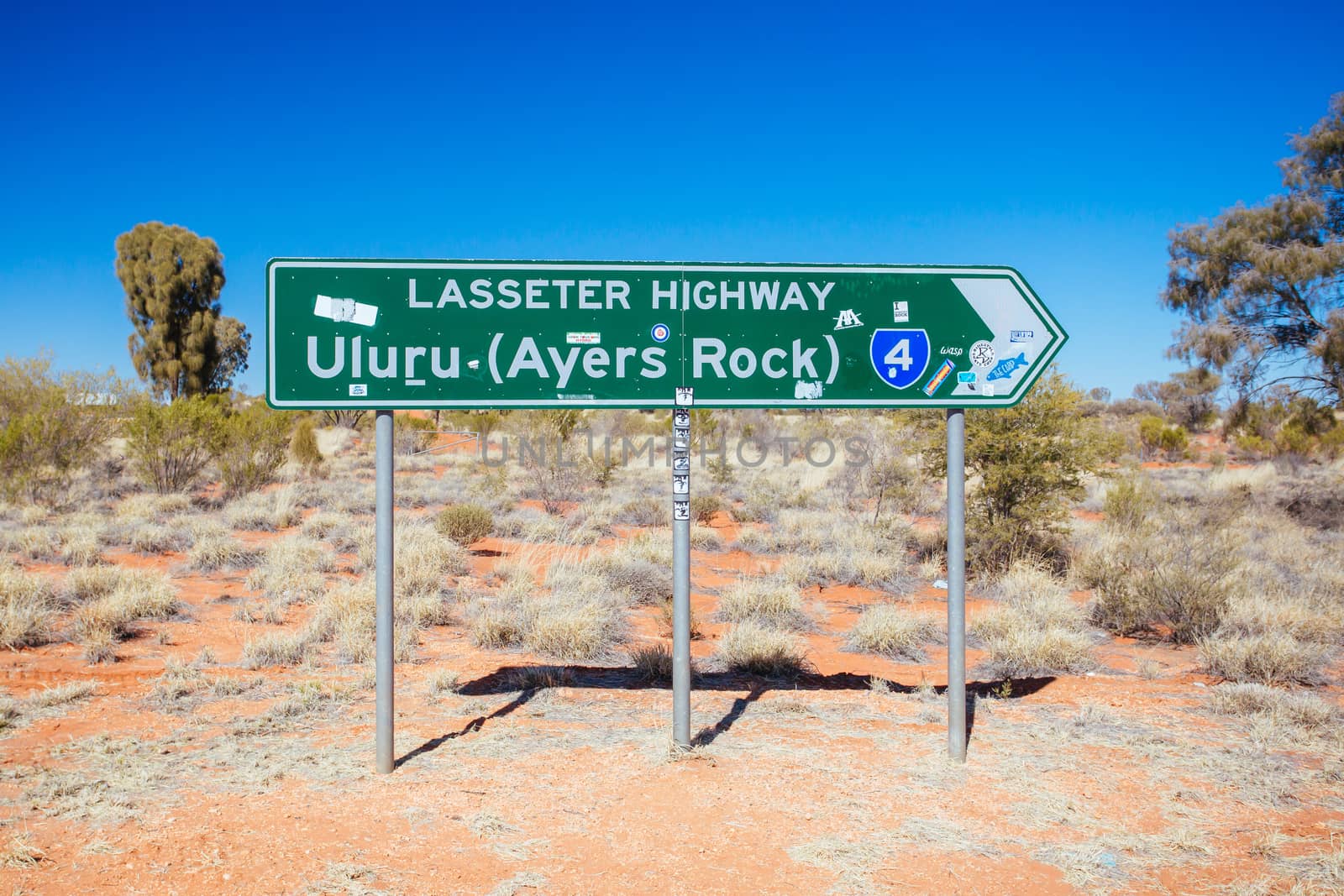 Uluru Road Sign in Outback Australia by FiledIMAGE