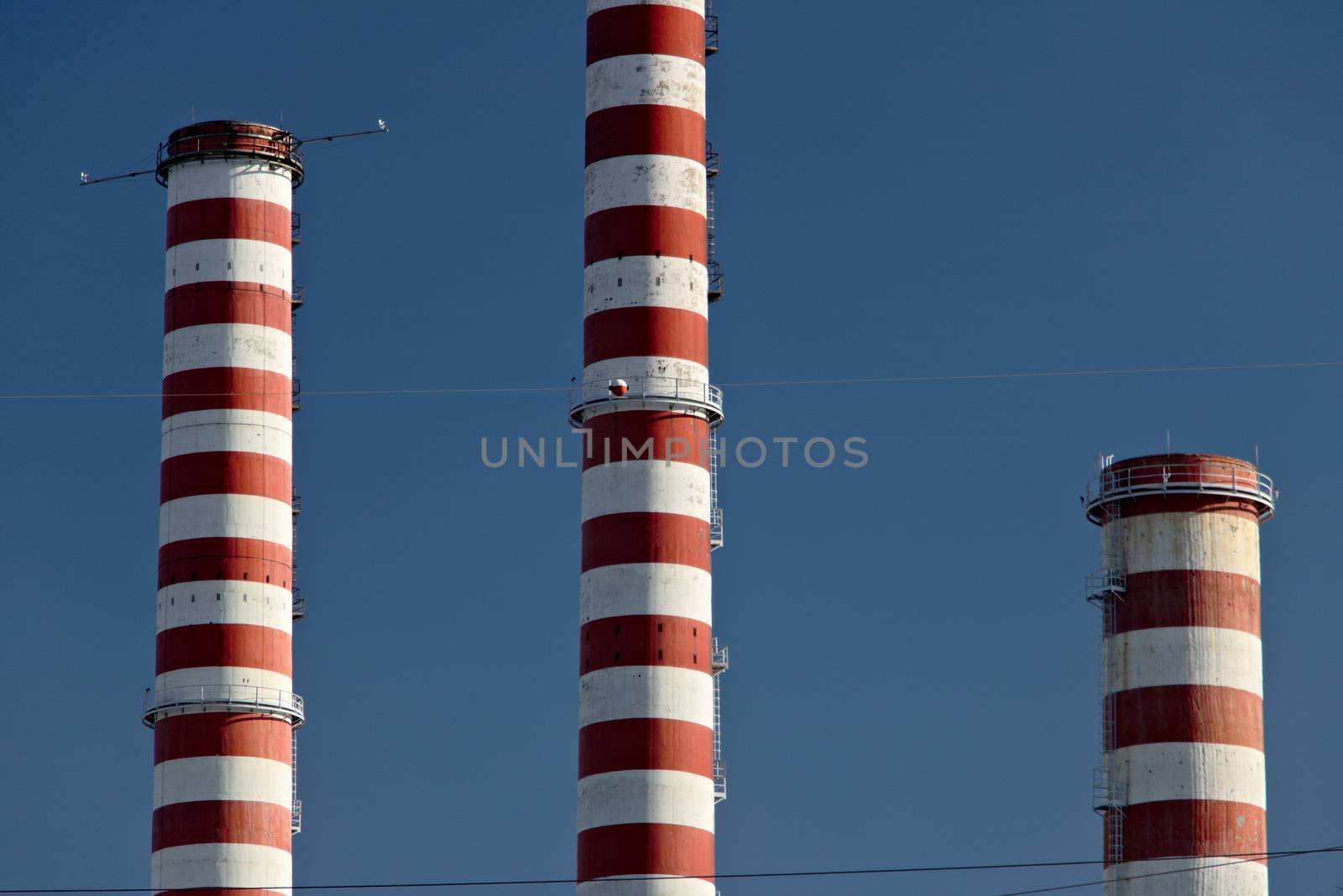 The white and red chimneys belong to the Iren plant in Turbigo, near Milan, Lombardy