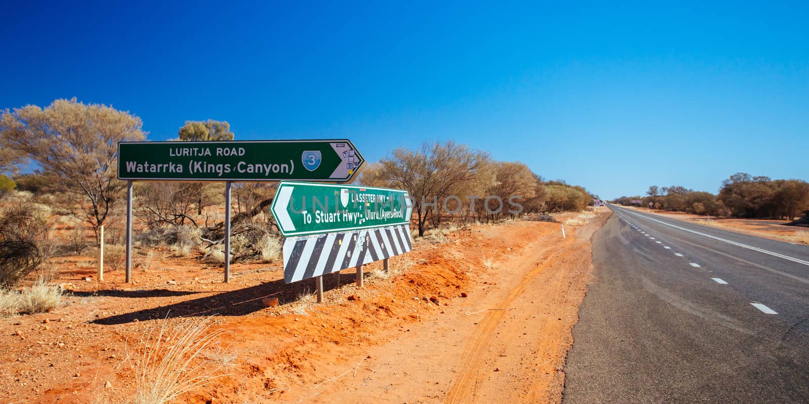 Erldunda, Australia - July 2 2015: Road sign directing towards Uluru and Kings Canyon in the Northern Territory, Australia