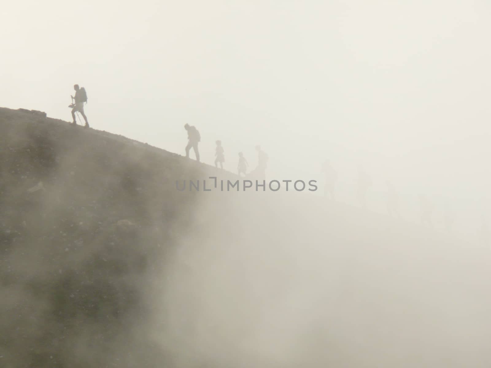 A group of mountaineers on the slopes of a mountain by Paolo_Grassi