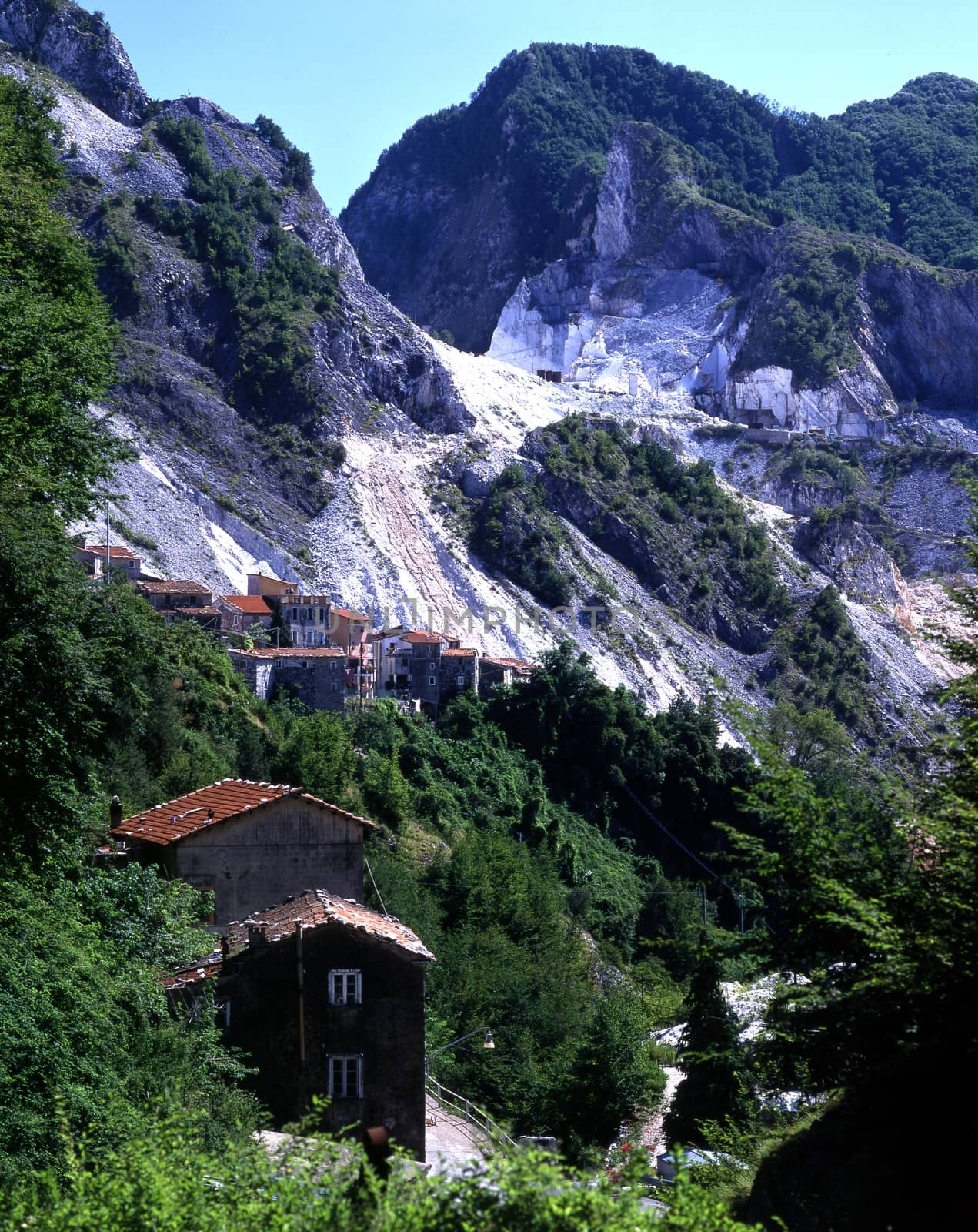 In the background the marble quarries on the Apuan Alps. (Tuscany, Italy).  Location famous for the production of Lardo di Colonnata. 