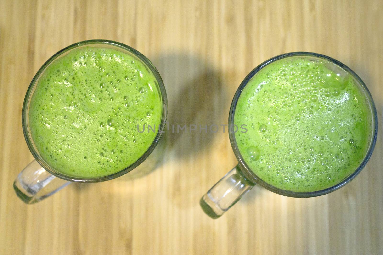 Green celery juice detoxifying drink. Vegan drink