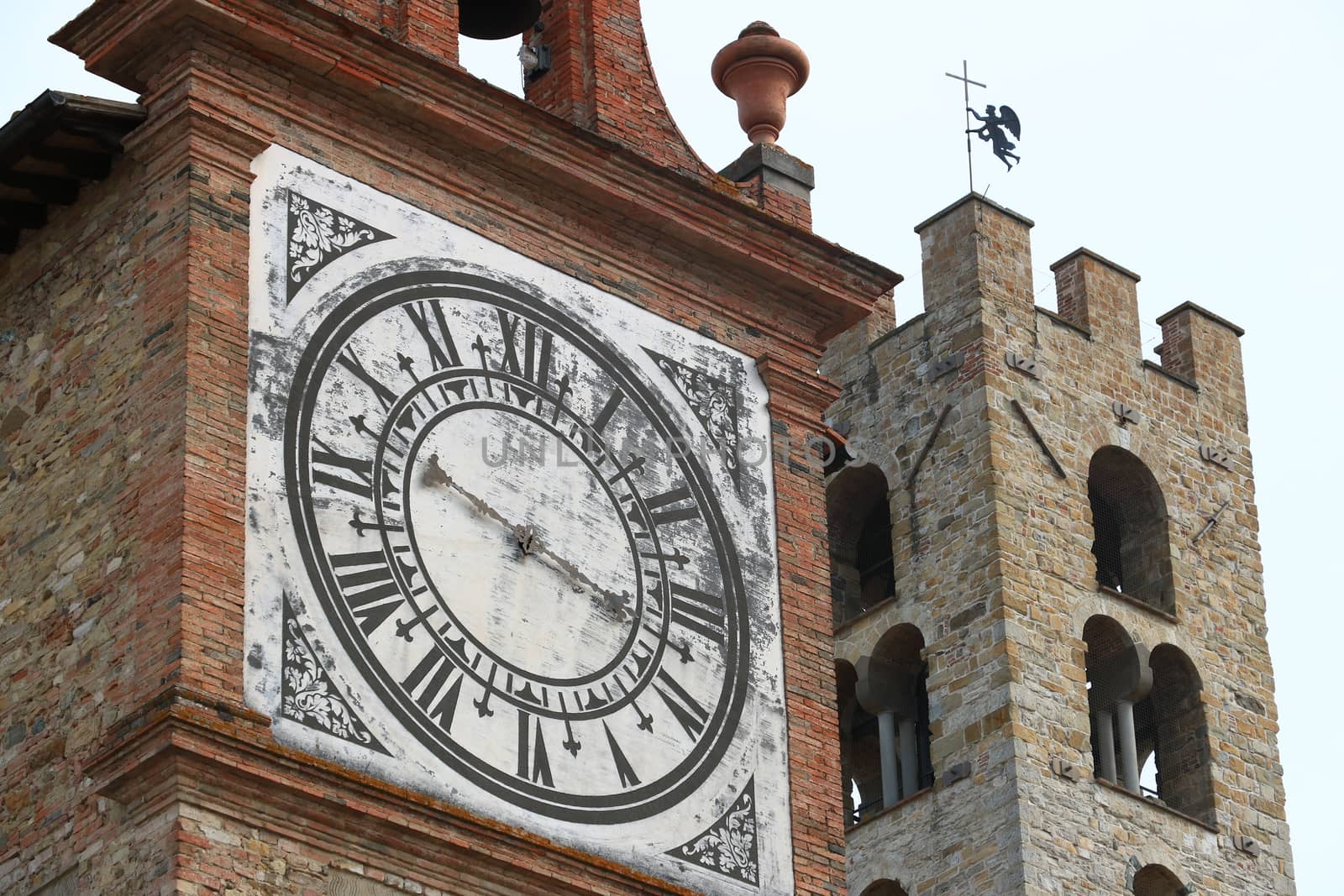 Towers with bell tower and large clock at the church of Imprunet by Paolo_Grassi