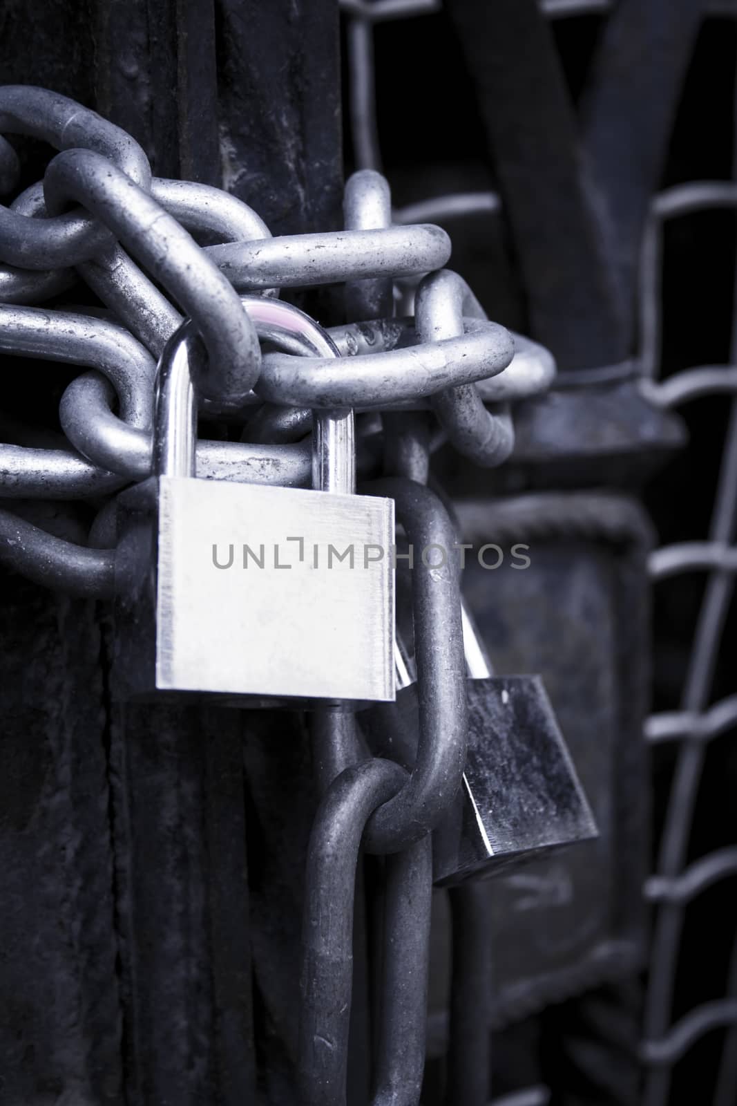 Closed door with chains and padlock