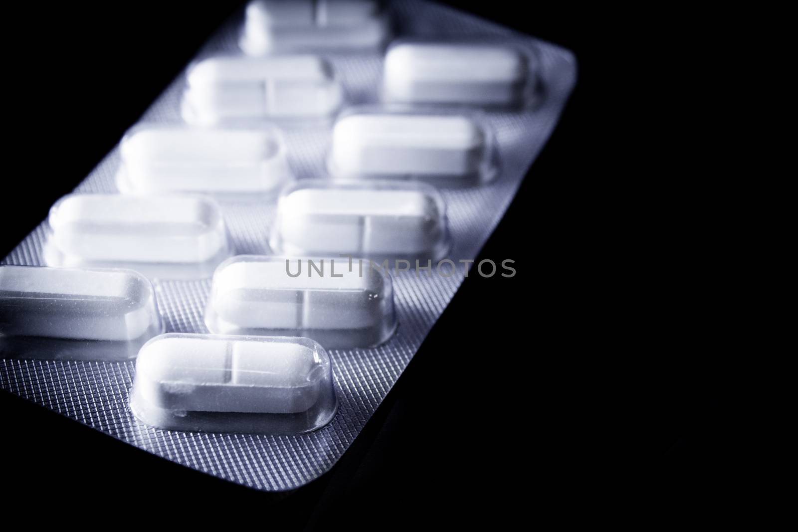 Tablet pack of white medicinal pills