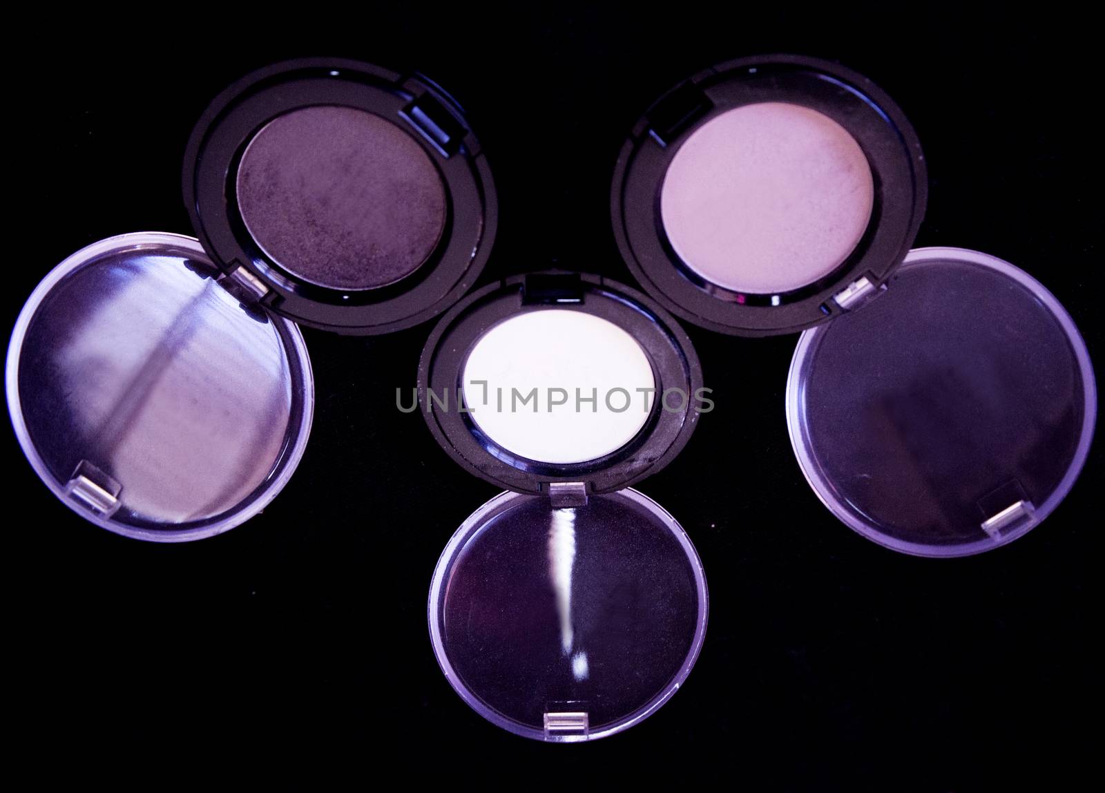 Color palette with eyeshadow powder. Earth colors