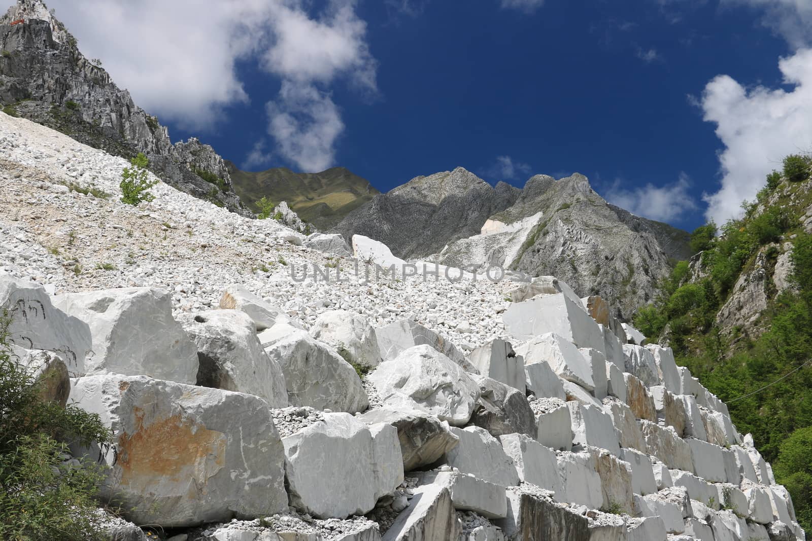 White Carrara marble quarries near Colonnata. A steep street wit by Paolo_Grassi