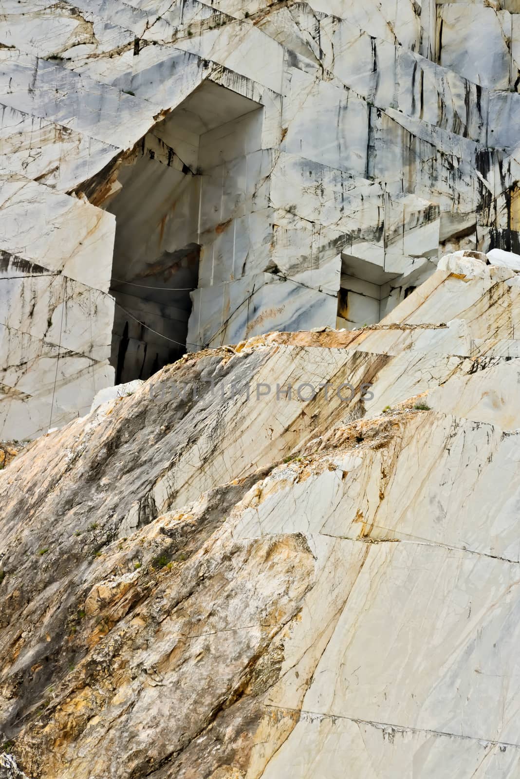 Apuan Alps, Carrara, Tuscany, Italy. A quarry of white marble. The precious white Carrara marble has been extracted from the Alpi Apuane quarries since Roman times.