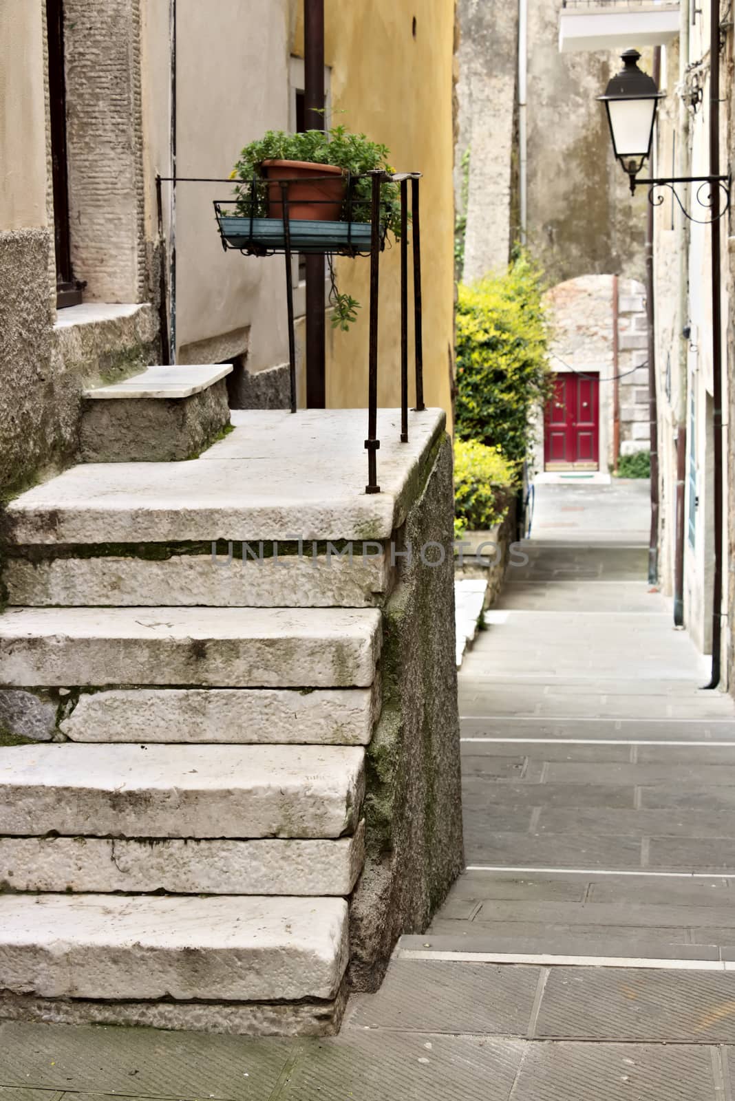 Colonnata, Carrara, Tuscany, Italy. Street of the ancient village of Colonnata, famous for the production of lard. The ancient village of white marble quarrymen is located above Carrara, in northern Tuscany.