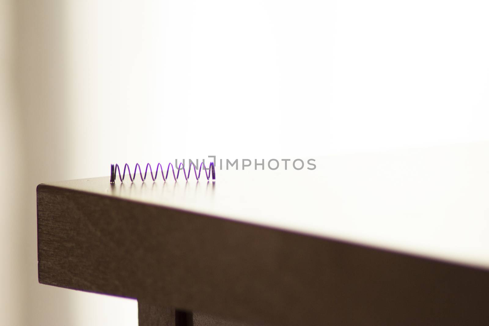 Small wire spring of a ballpoint pen. No people