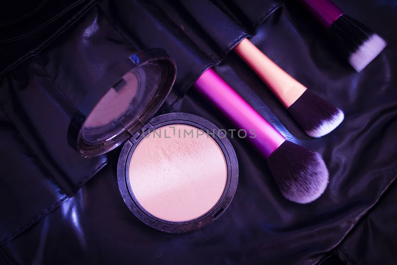 Facial makeup, eyeshadow and makeup brushes. No people