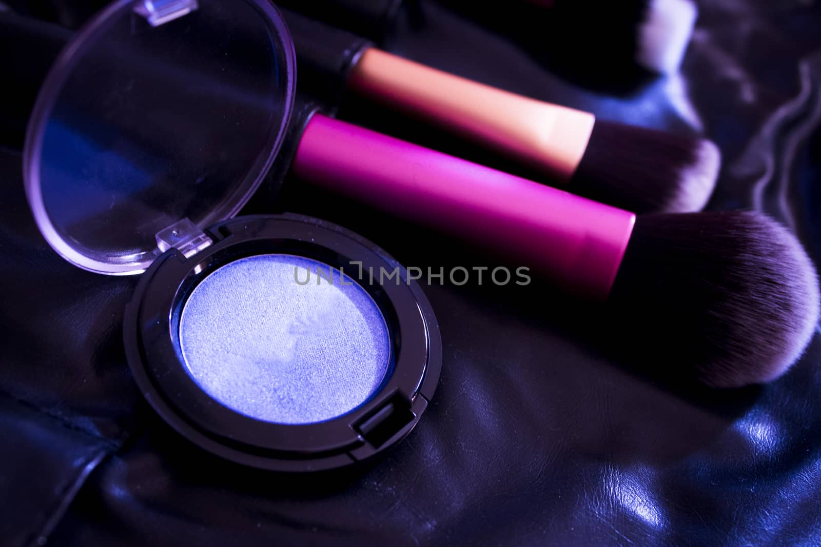 Facial makeup, eyeshadow and makeup brushes. No people