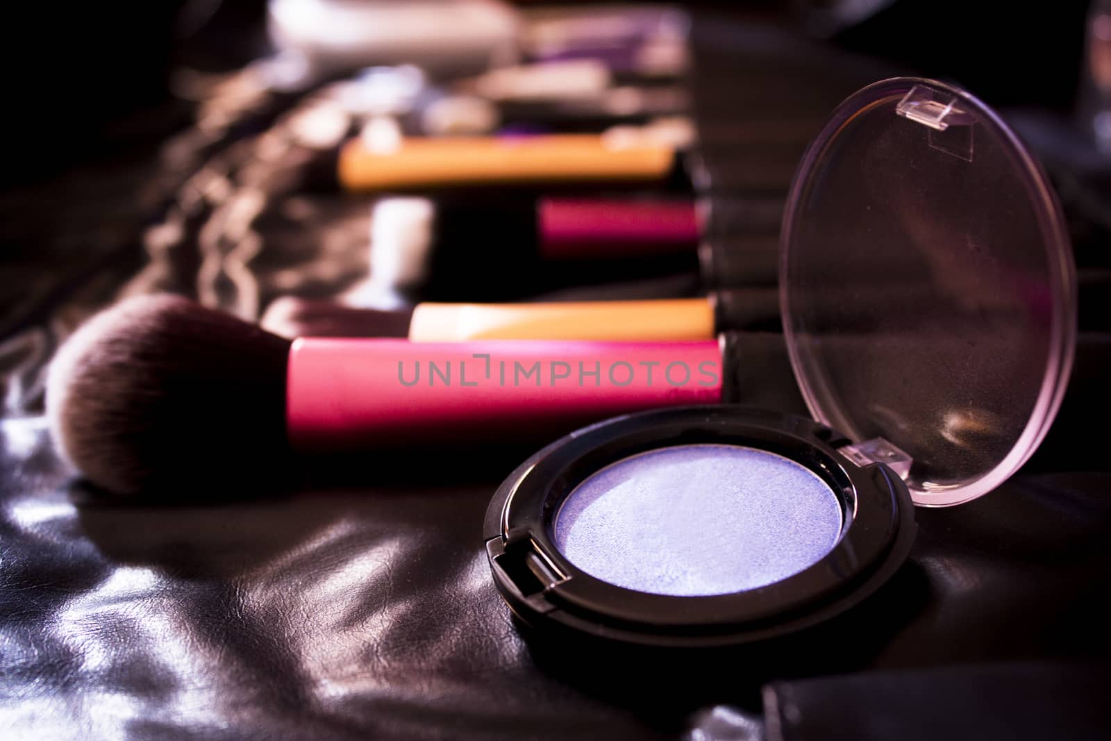 Facial makeup, eyeshadow and makeup brushes. No people