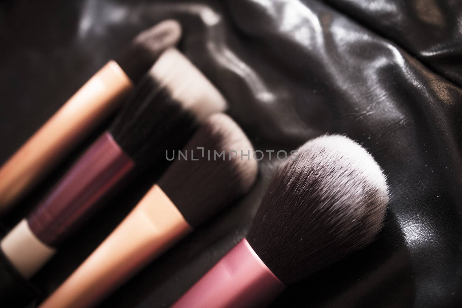 Facial makeup, eyeshadow and makeup brushes. No people