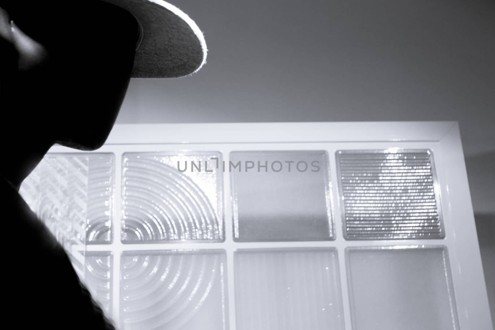 Black male mannequin without defined face with cap