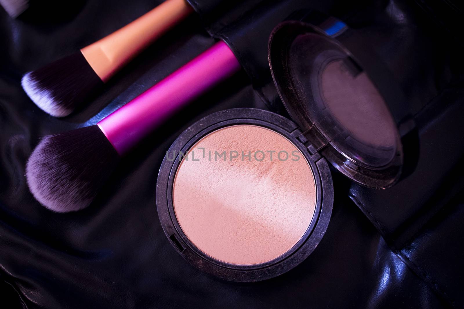 Facial makeup, eyeshadow and makeup brushes. No people