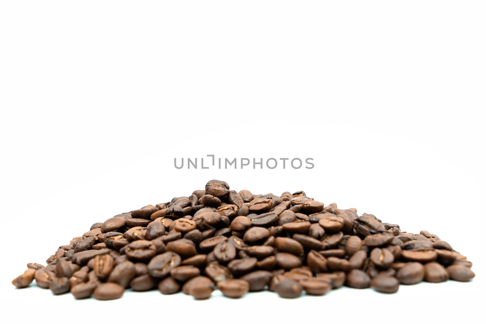 Coffee beans pile on isolated white background