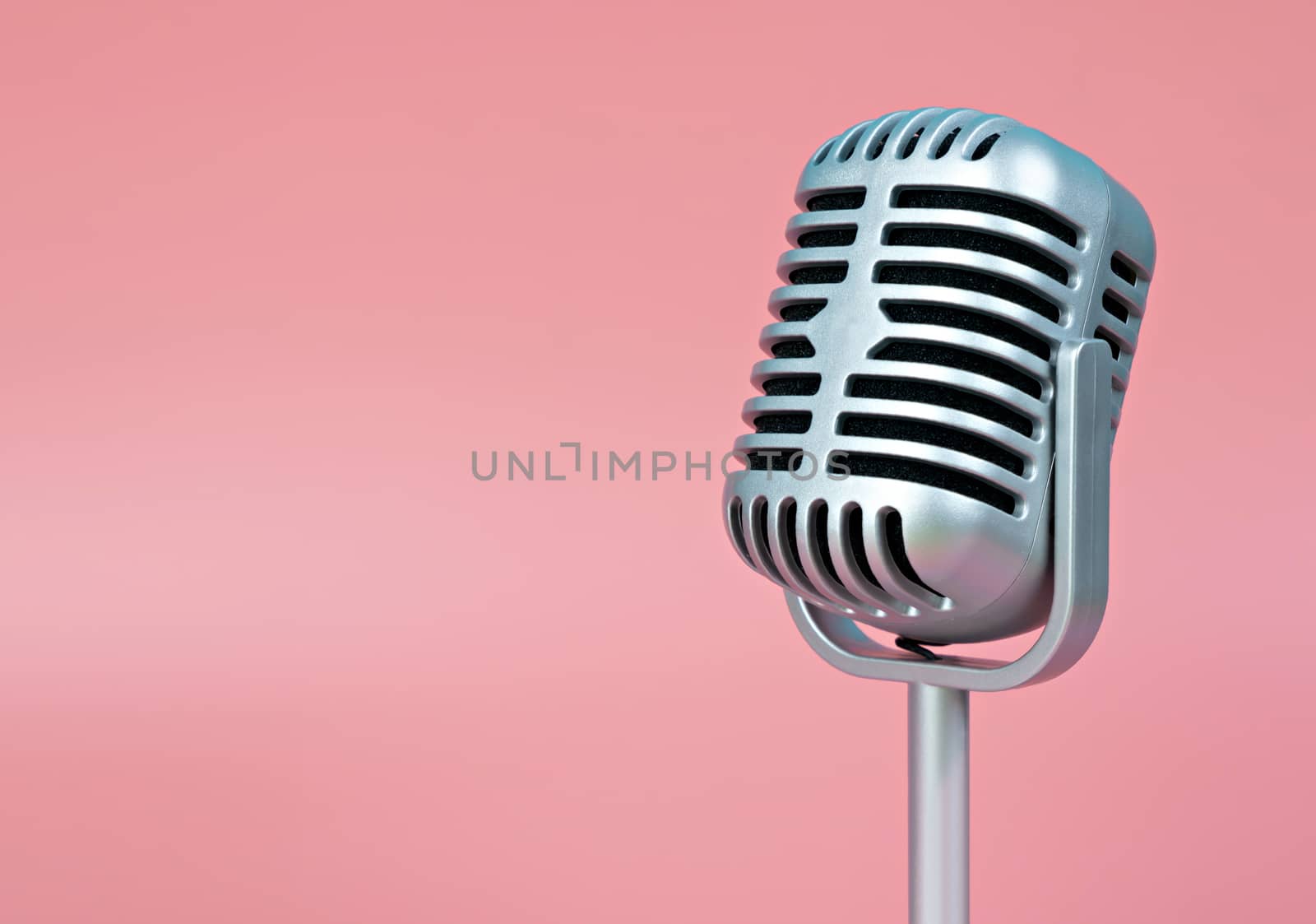 Microphone retro with copy space on pink background