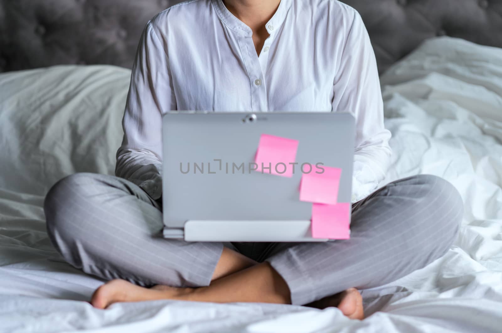 Businesswoman use laptop for work from home by Buttus_casso