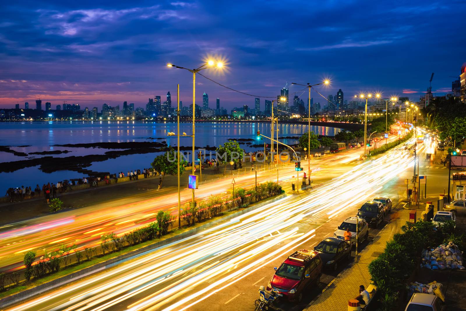 Mumbai famous iconic tourist attraction Queen's Necklace Marine drive in the night with car light trails. Mumbai, Maharashtra, India