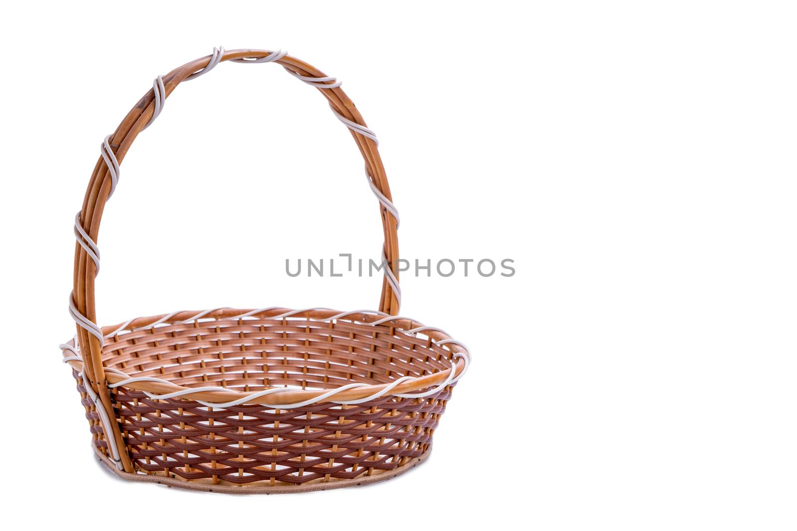 Empty wicker basket isolated on white background by Buttus_casso