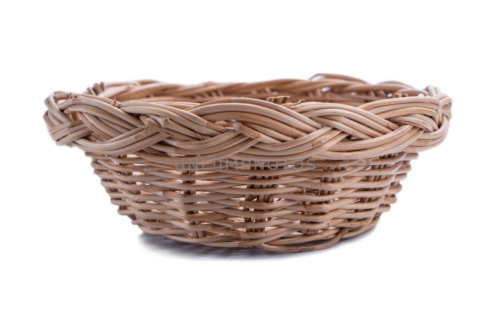 Empty wicker basket  isolated on white background by Buttus_casso
